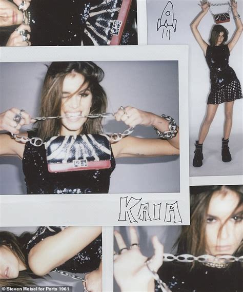 Kaia Gerber goes TOPLESS under a leather jacket for a new。